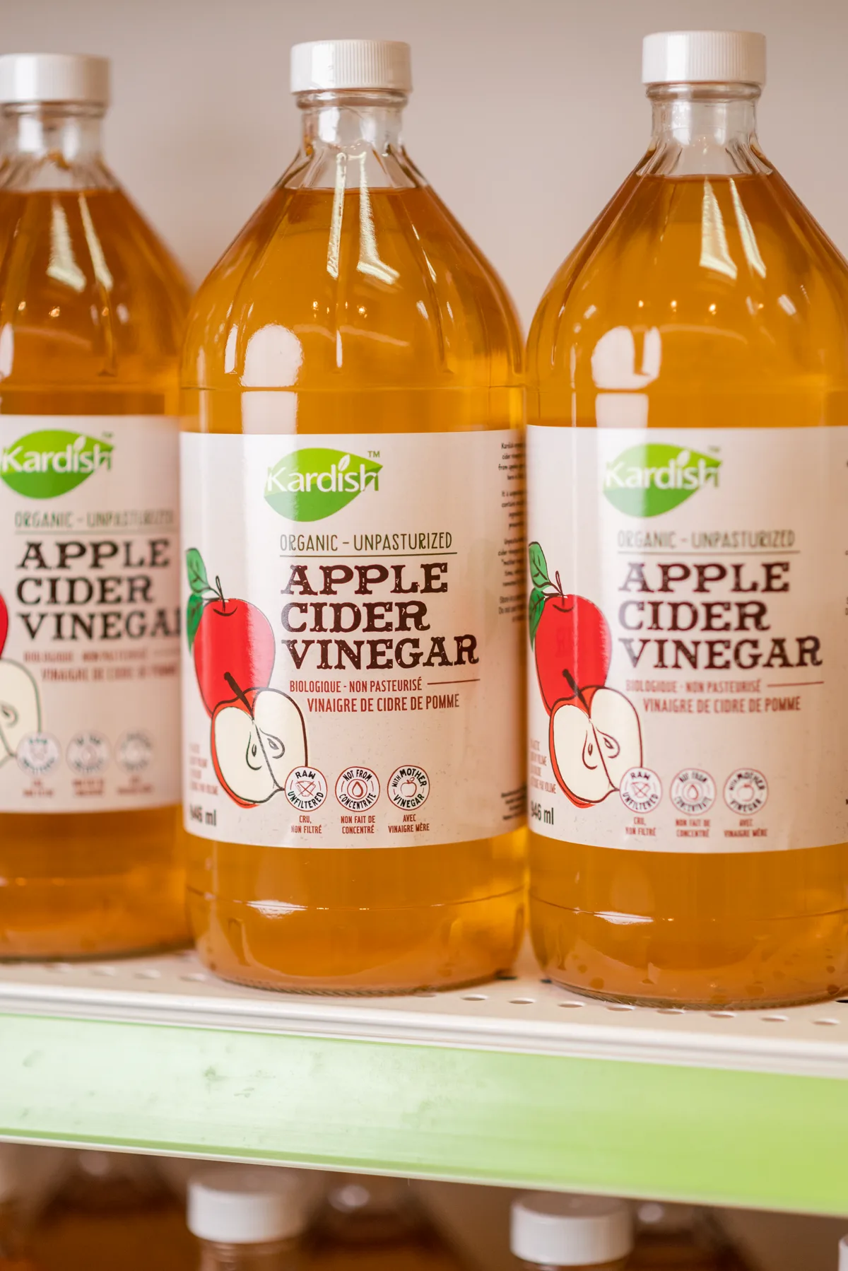 Kardish-brand organic apple cider vinegar bottles on a store shelf